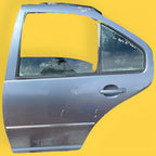 Puerta Trasera Izquierda Vw Jetta A4 Usada Original 99-07 Trasera Izquierdo Gris