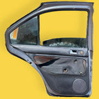 Puerta Trasera Izquierda Vw Jetta A4 Usada Original 99-07 Trasera Izquierdo Gris